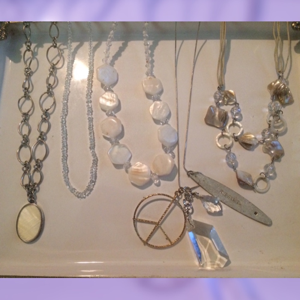 Five white peace beaded necklaces